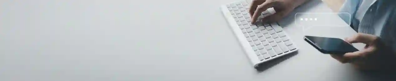 person typing on keyboard